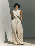 A set consisting of a sleeveless blouse and wide-leg pants made of a cotton-linen blend.