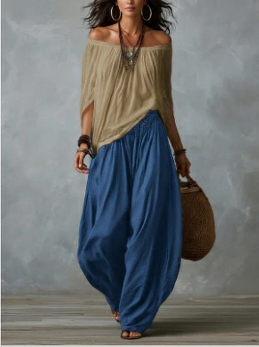 White off-the-shoulder top and flared “lantern-style” pants set