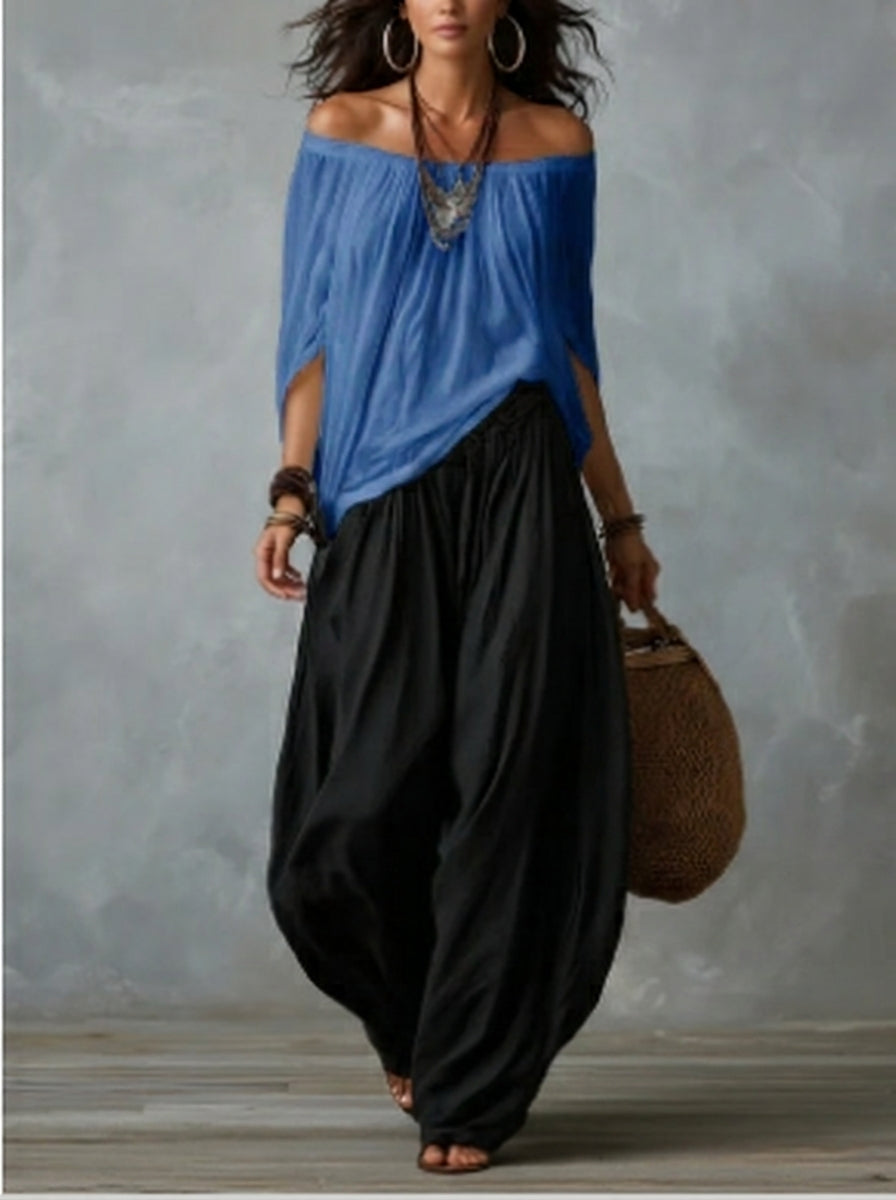 White off-the-shoulder top and flared “lantern-style” pants set