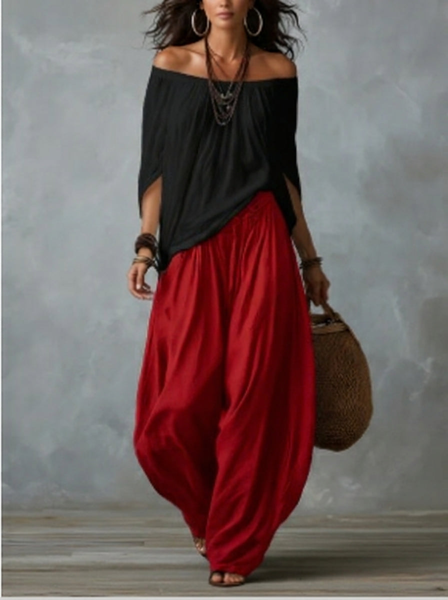 White off-the-shoulder top and flared “lantern-style” pants set