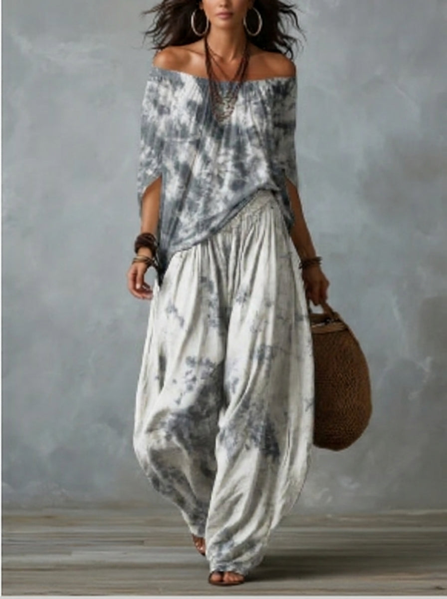 White off-the-shoulder top and flared “lantern-style” pants set