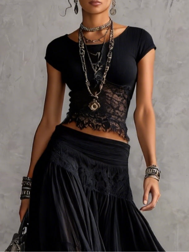 Ginevra · Set consisting of a sheer top with black lace panels and a pleated maxi skirt