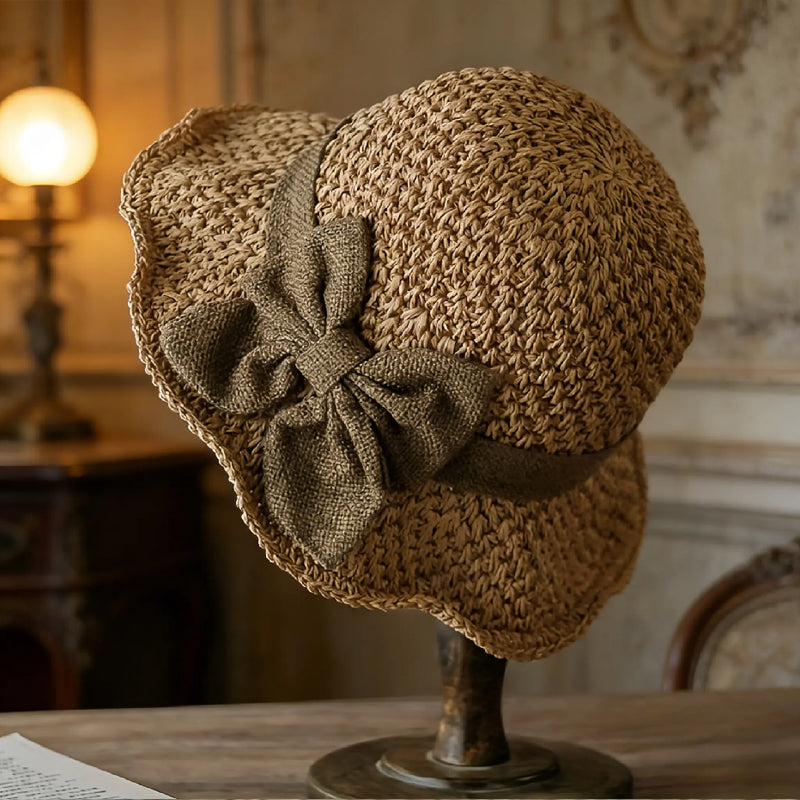 Elegant woven straw sun hat with a bow