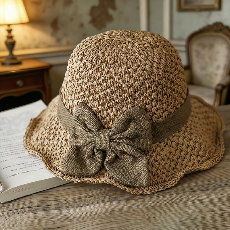 Elegant woven straw sun hat with a bow