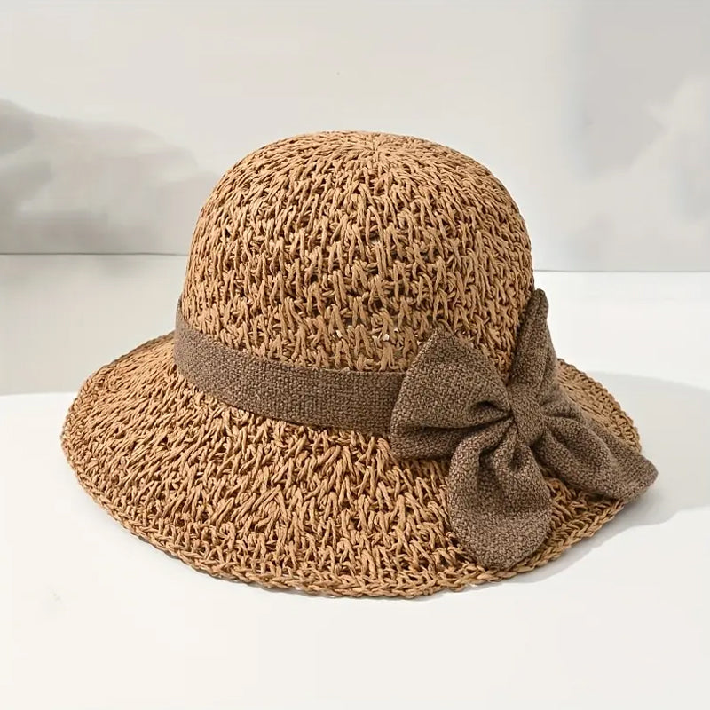 Elegant woven straw sun hat with a bow