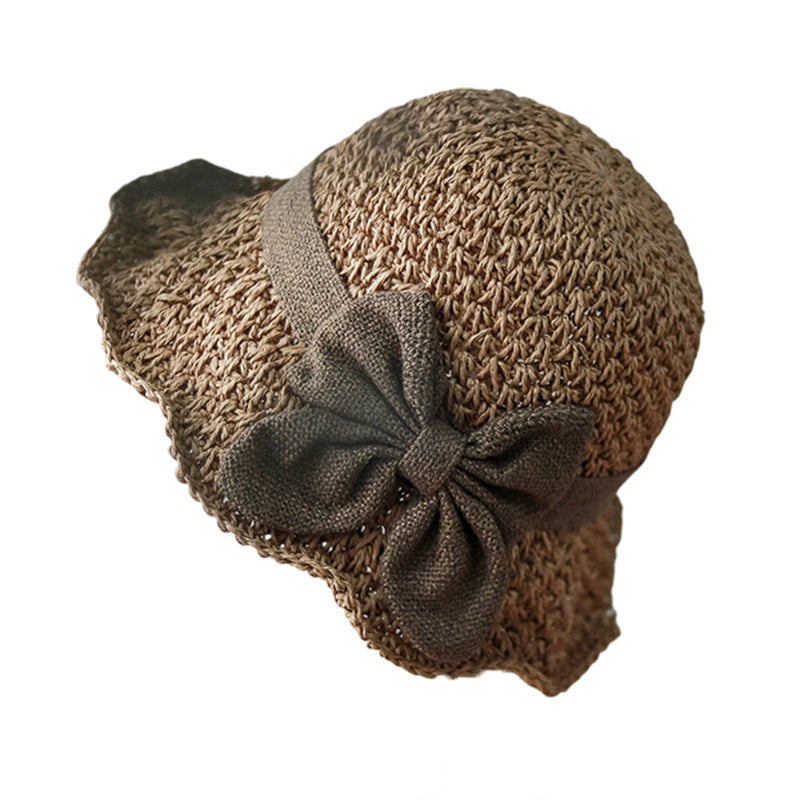 Elegant woven straw sun hat with a bow