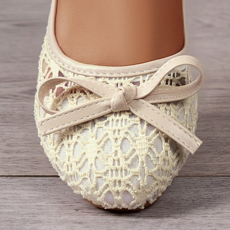 Elegant lace ballet flats for women, adorned with a bow